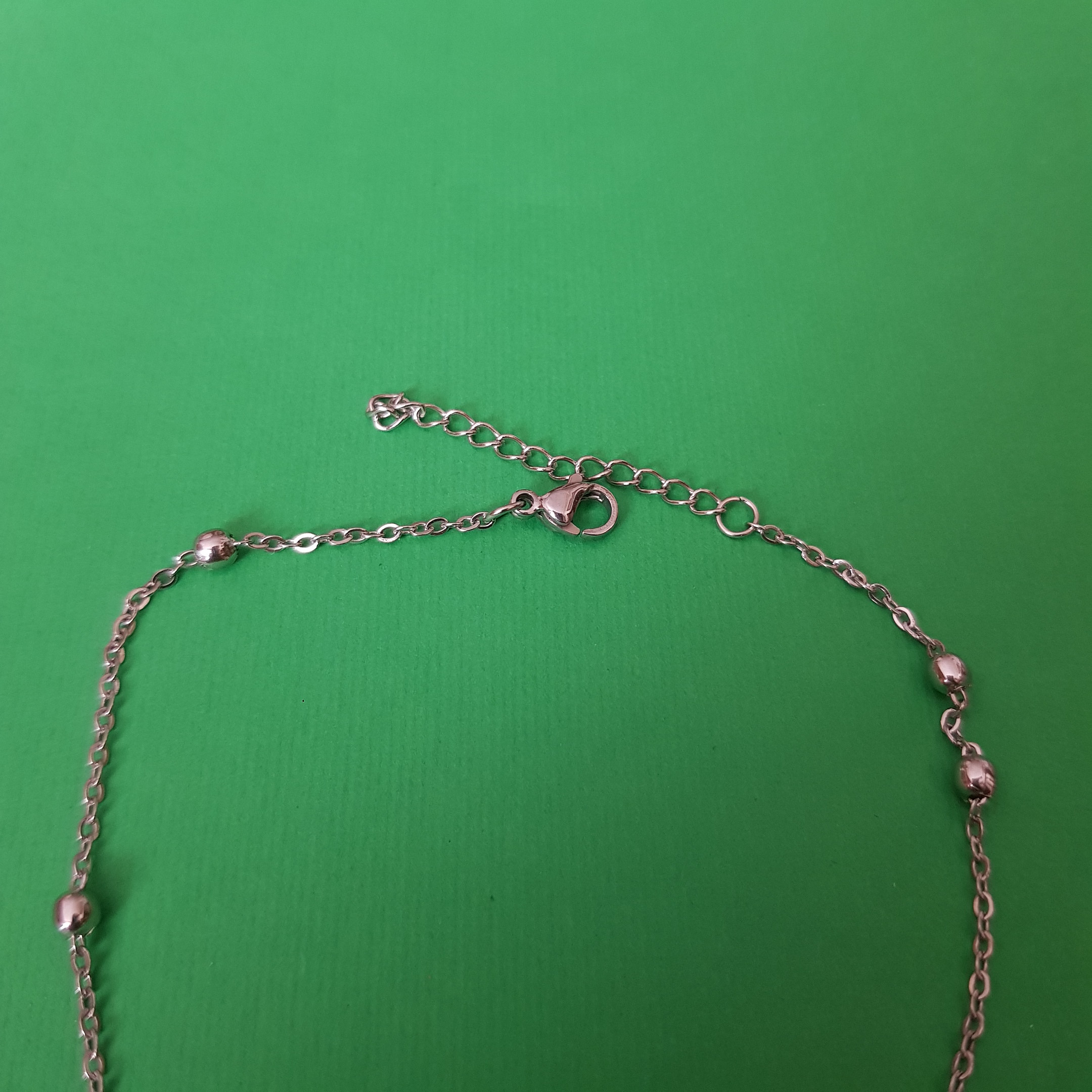 پابند زنانه مدل تک قلب و گوی