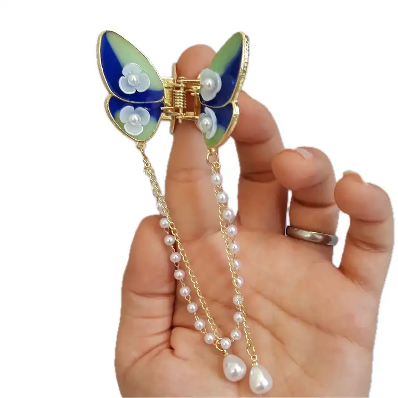 کلیپس مو زنانه مدل فلزی طرح پروانه