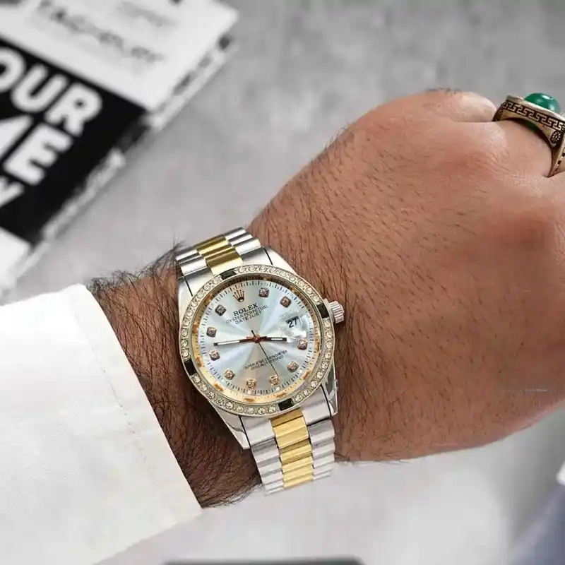 ساعت مچی عقربه‌ای مردانه مدل دورنگین قفل مخفی کد Tn-w