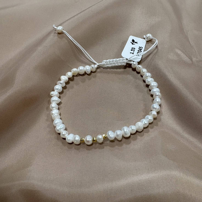 دستبند طلا 18 عیار زنانه با بند مهره‌ای گالری طلای عیاره مدل مروارید پرورشی 43
