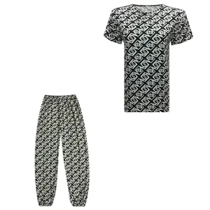 ست تی شرت آستین کوتاه و شلوار زنانه مدل سانای گیاهی ابر و بادی کد tm-1826 رنگ مشکی