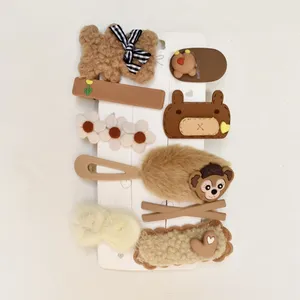 ست گیره و سنجاق مو دخترانه مدل WoolB01 بسته 10 عددی