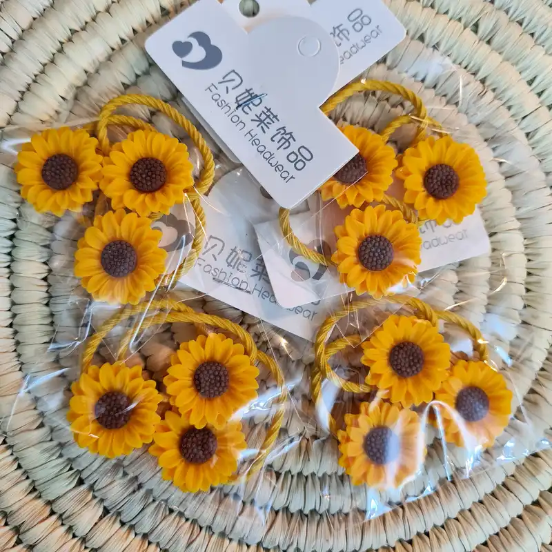 کش مو دخترانه مدل آفتابگردان کد 1397 بسته 3 عددی