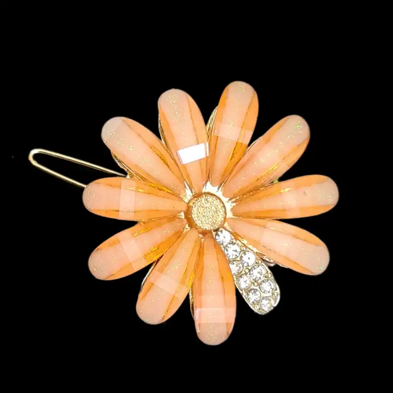 گیره مو زنانه مدل بابونه کریستالی B01