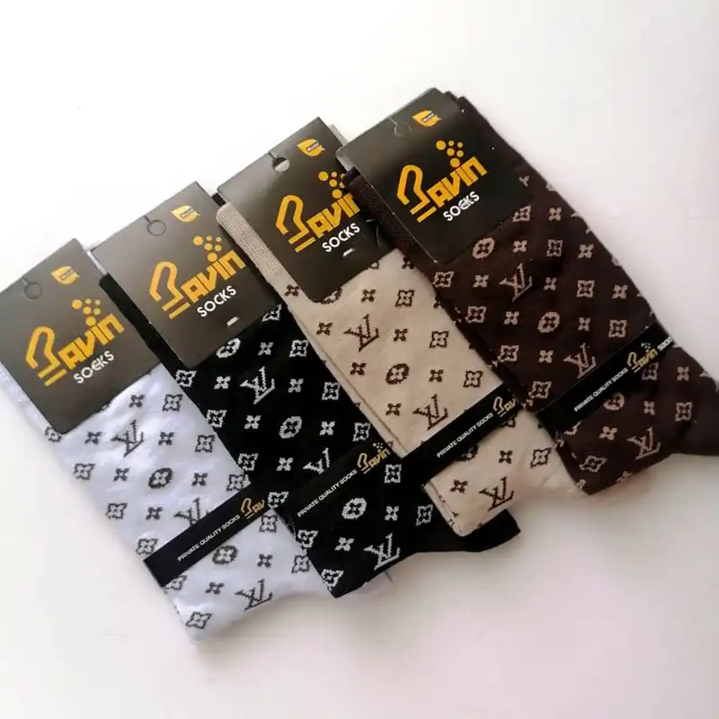 جوراب ساق بلند زنانه پاوین مدل سه ربع مجموعه چهار عددی