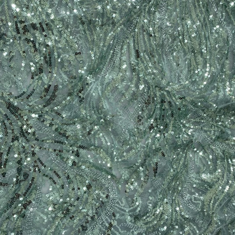 پارچه لباس عرض ۱.۵ متر مدل توری مجلسی پولک کار شده رنگ سبز آبی