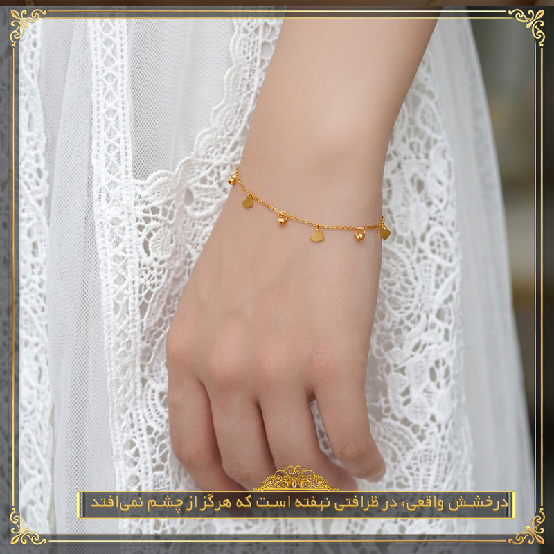 دستبند زنجیری طلا 18 عیار زنانه طلای معتمدی مدل قلب و گوی