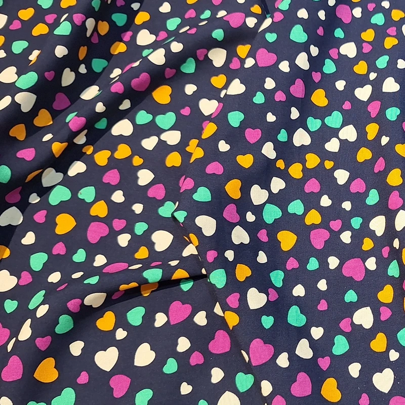 پارچه لباس عرض ۱.۵ متر مدل کدری نخی قلبی رنگ سرمه‌ای تیره