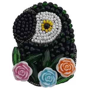 سنجاق سینه زنانه مدل طوطی گلدار کد 003