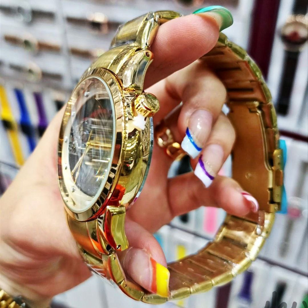 ساعت مچی عقربه‌ای مردانه  مدل پشت شیشه ای موتور پیدا