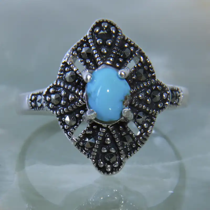 انگشتر نقره زنانه بازرگانی میلادی مدل سنگ فیروزه طبیعی نیشابور نیگن مارکازیت سیاه قلم کد AW_206