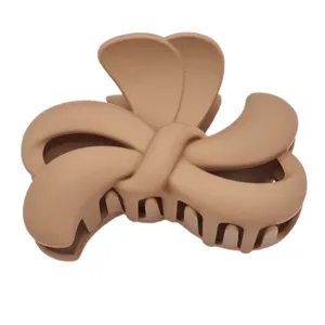 کلیپس مو زنانه مدل پاپیون شمعی مات کد brg p340