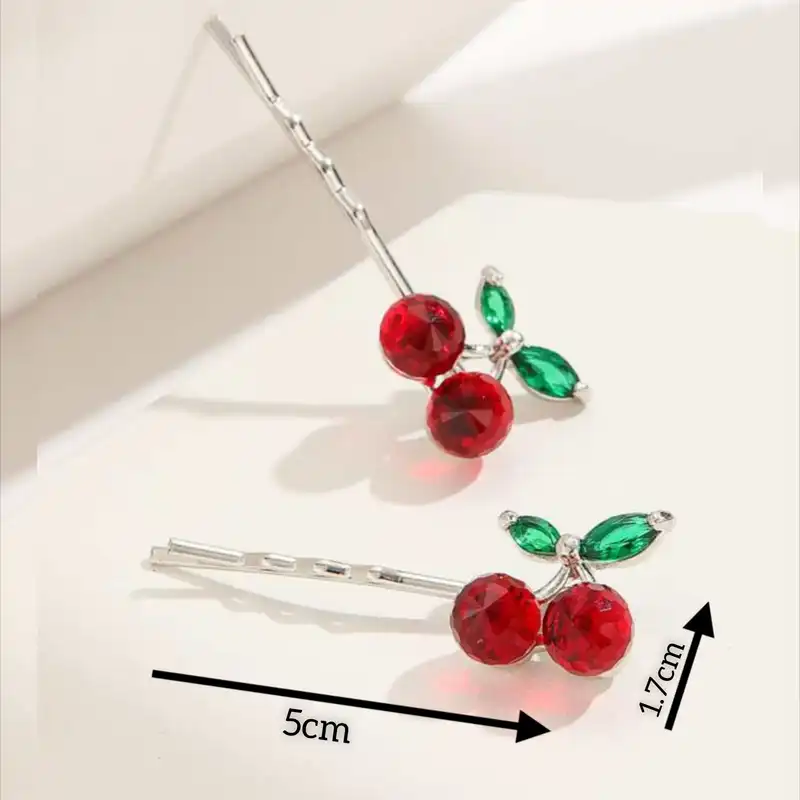 گیره مو زنانه مدل نگین دار مجلسی طرح گیلاس کد brg 1870 بسته 2 عددی