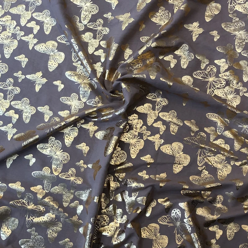 پارچه لباس عرض ۱.۵ متر مدل ۰۰۱۹ رنگ طلایی