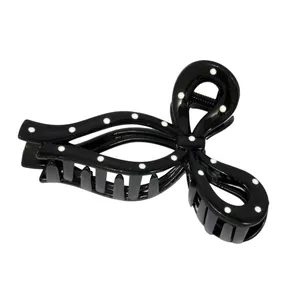 کلیپس مو زنانه مدل پاپیونی خال خال کد G_Lnd_1556