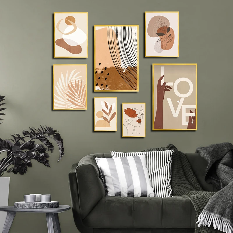 تابلو بکلیت طرح نقاشی مینیمال چهره و دست و برگ مدل T-3380 فریم طلایی مجموعه 7 عددی