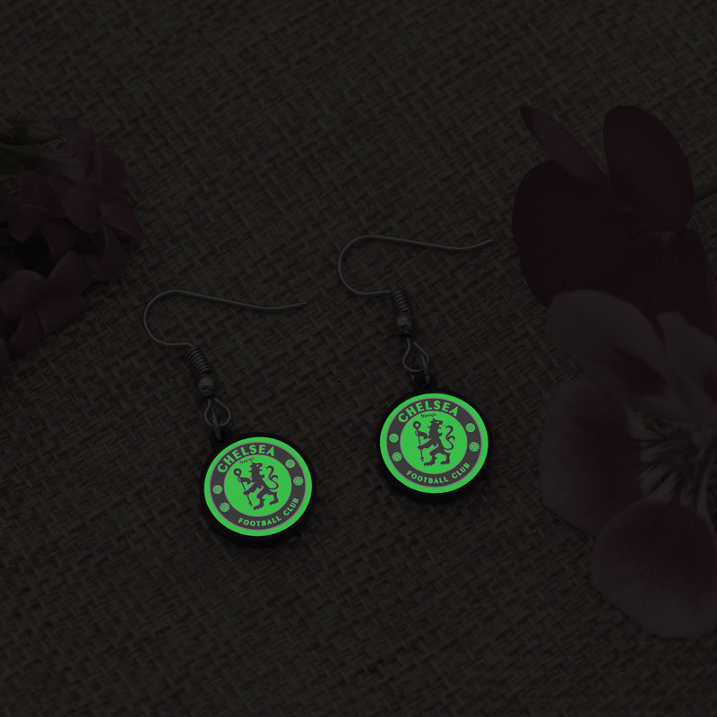 گوشواره زنانه ناکسیگو مدل شب تاب طرح چلسی کد ES7312 گوشواره زنانه ناکسیگو مدل شب تاب طرح چلسی کد ES7312