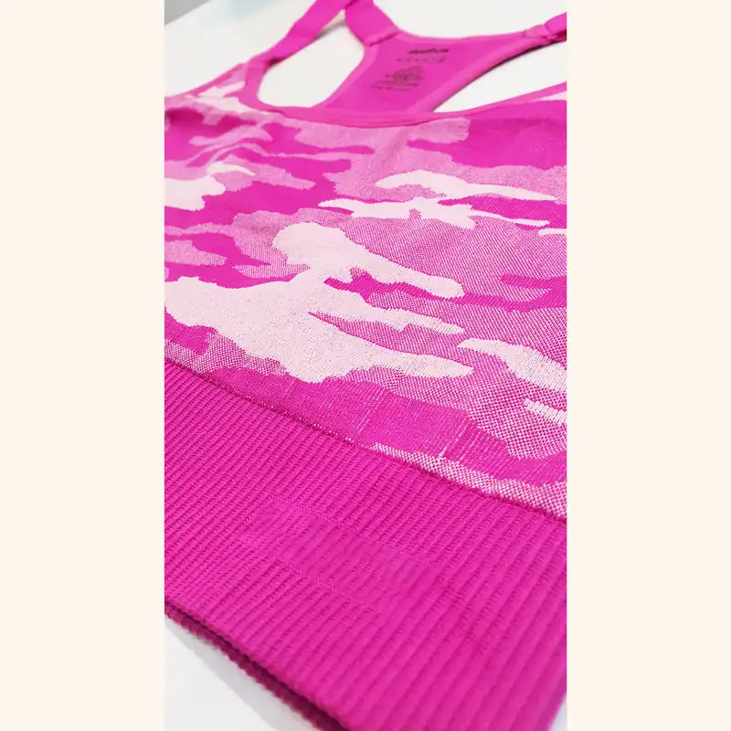 نیم تنه ورزشی زنانه مدل سیملس پشت قهرمانی رنگ صورتی