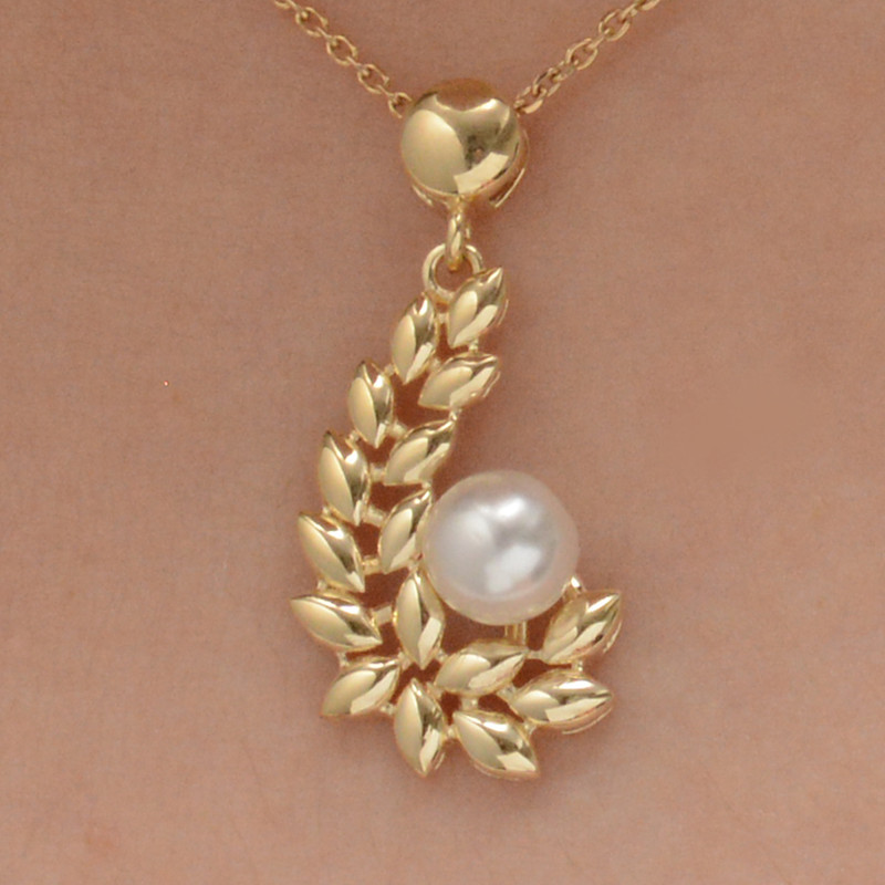 نیم ست طلا 18 عیار زنانه طلای مستجابی مدل زیتون 670135