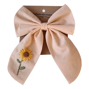 پاپیون دست دوز زنانه مدل آفتابگردان