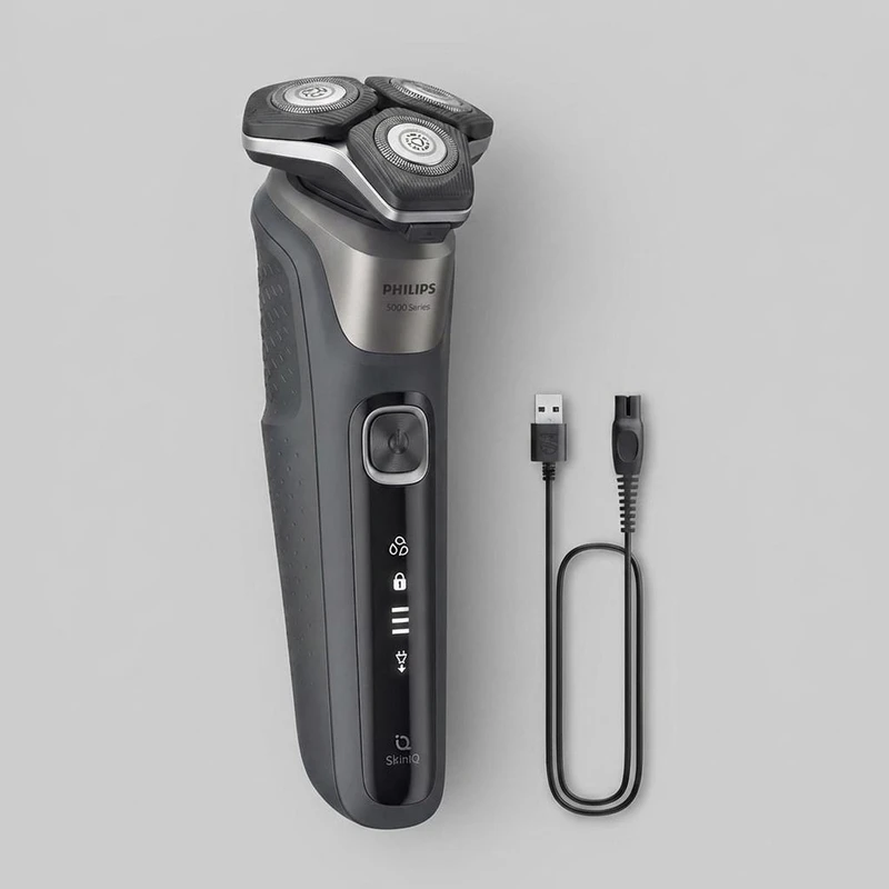 ماشین اصلاح موی صورت فیلیپس مدل SHAVER 5000 Series با تیغه‌های کربن استیل، سنسور هوشمند، سرهای انعطاف‌پذیر 360 درجه، ضد آب، قابلیت اصلاح با شماره صفر، شارژ سریع و منبع انرژی کابل USB