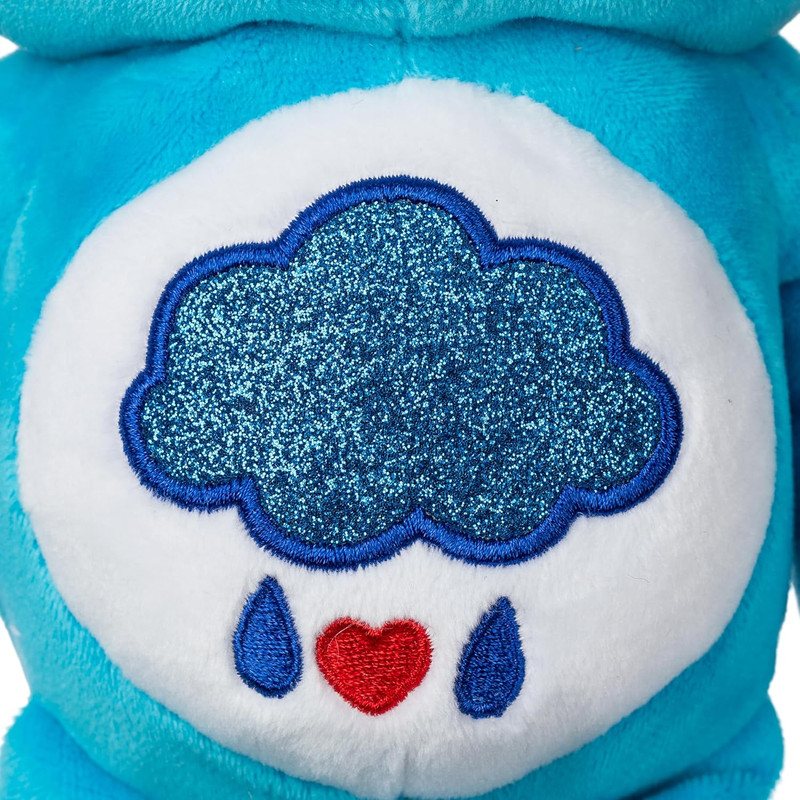 عروسک کر برز مدل Grumpy Glitter Bear کد 22483 ارتفاع 24 سانتی متر