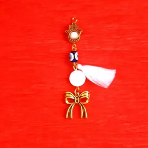 گل سینه دخترانه مدل چشم نظر کد 1557