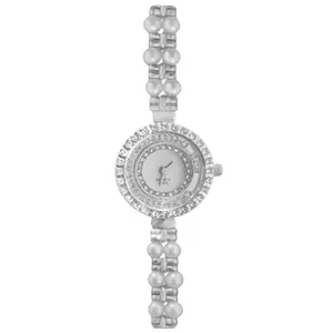ساعت مچی عقربه‌ای کوارتز زنانه مدل لوکس بند دستبندی مرواریدی قاب دور شنی نگین دار کد ۱.۹