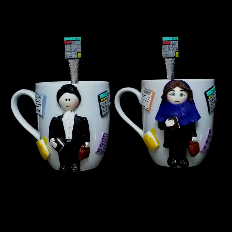 ماگ سرامیکی مدل حسابدار کد L622 به همراه قاشق مجموعه 2 عددی