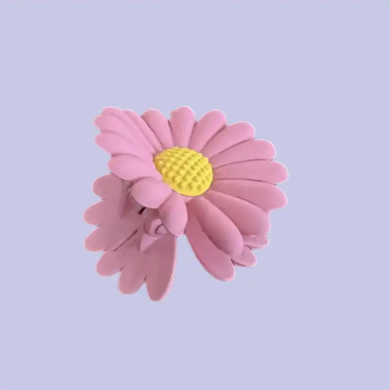 کلیپس مو زنانه مدل گل بابونه شمعی