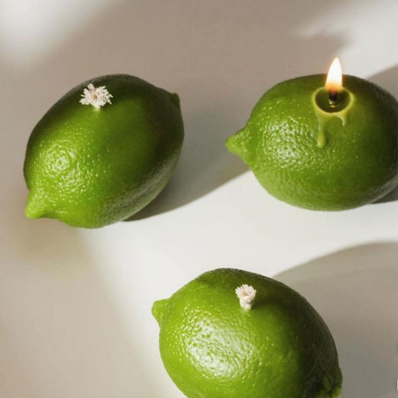 شمع دست ساز معطر مدل لیمو با رایحه لیمو  زمان اتمام 4 ساعت