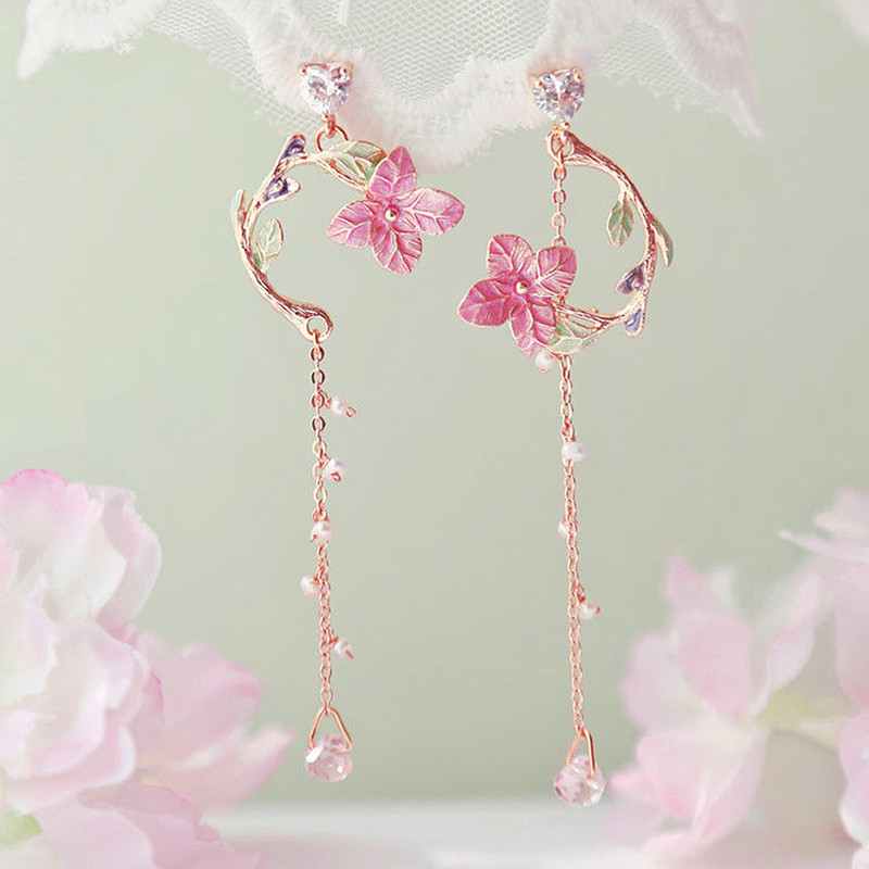 گوشواره زنانه مدل گل چهارپر کد 00667 گوشواره زنانه مدل گل چهارپر کد 00667