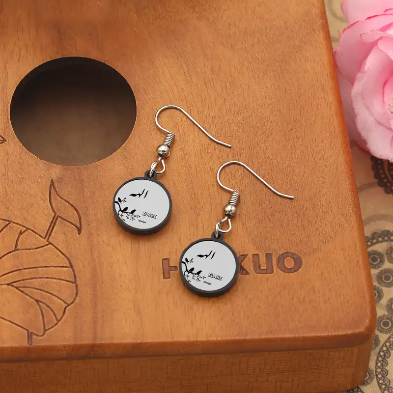 گوشواره زنانه ناکسیگو مدل شب تاب طرح الهه کد ES8563