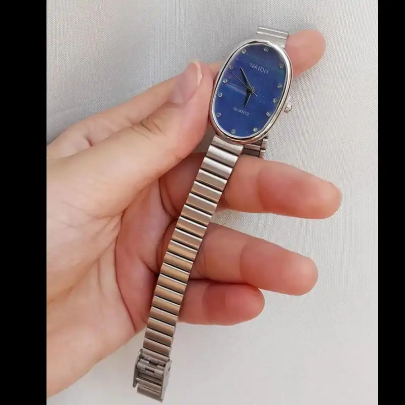 ساعت مچی عقربه ای زنانه مدل بند ریلی 03