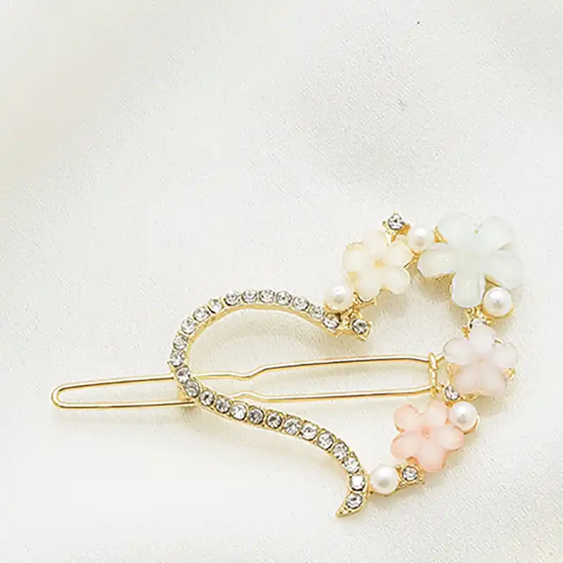 گیره مو زنانه مدل نگینی بابونه و قلب بسته 2 عددی