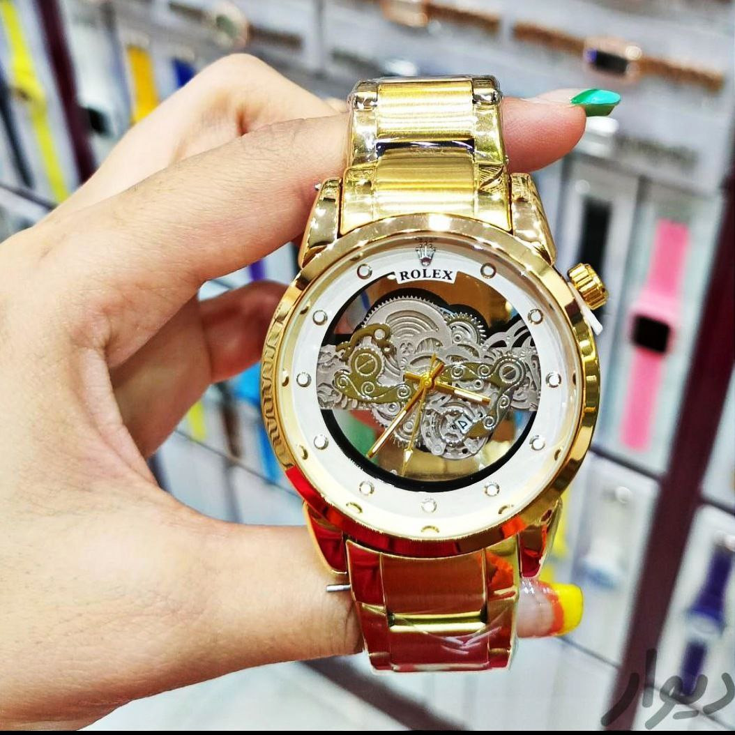 ساعت مچی عقربه‌ای مردانه  مدل پشت شیشه ای موتور پیدا