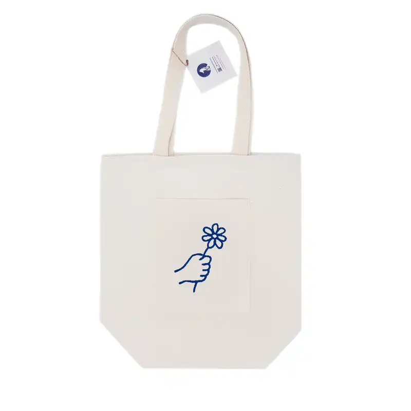 ساک دستی گدار مدل انبان جیب‌دار طرح گل