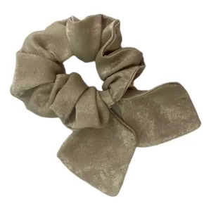 کش مو زنانه مدل آویز دار براق