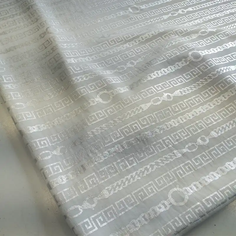 پارچه لباس مدل ابر و بادی طلاکوب