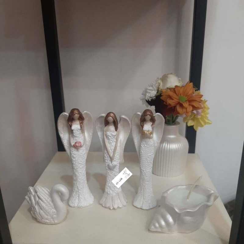 مجسمه دست ساز مدل فرشته قلب گل کیف در دست بسته ۳ عددی
