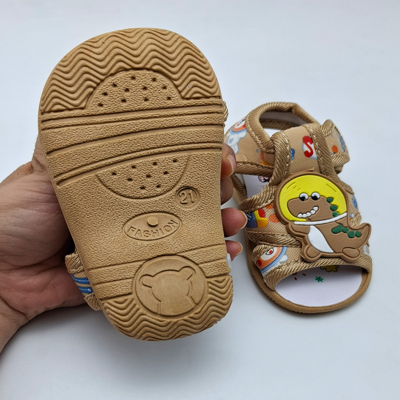 صندل نوزادی مدل سوتی طرح دایناسور کد A-1133 رنگ بژ