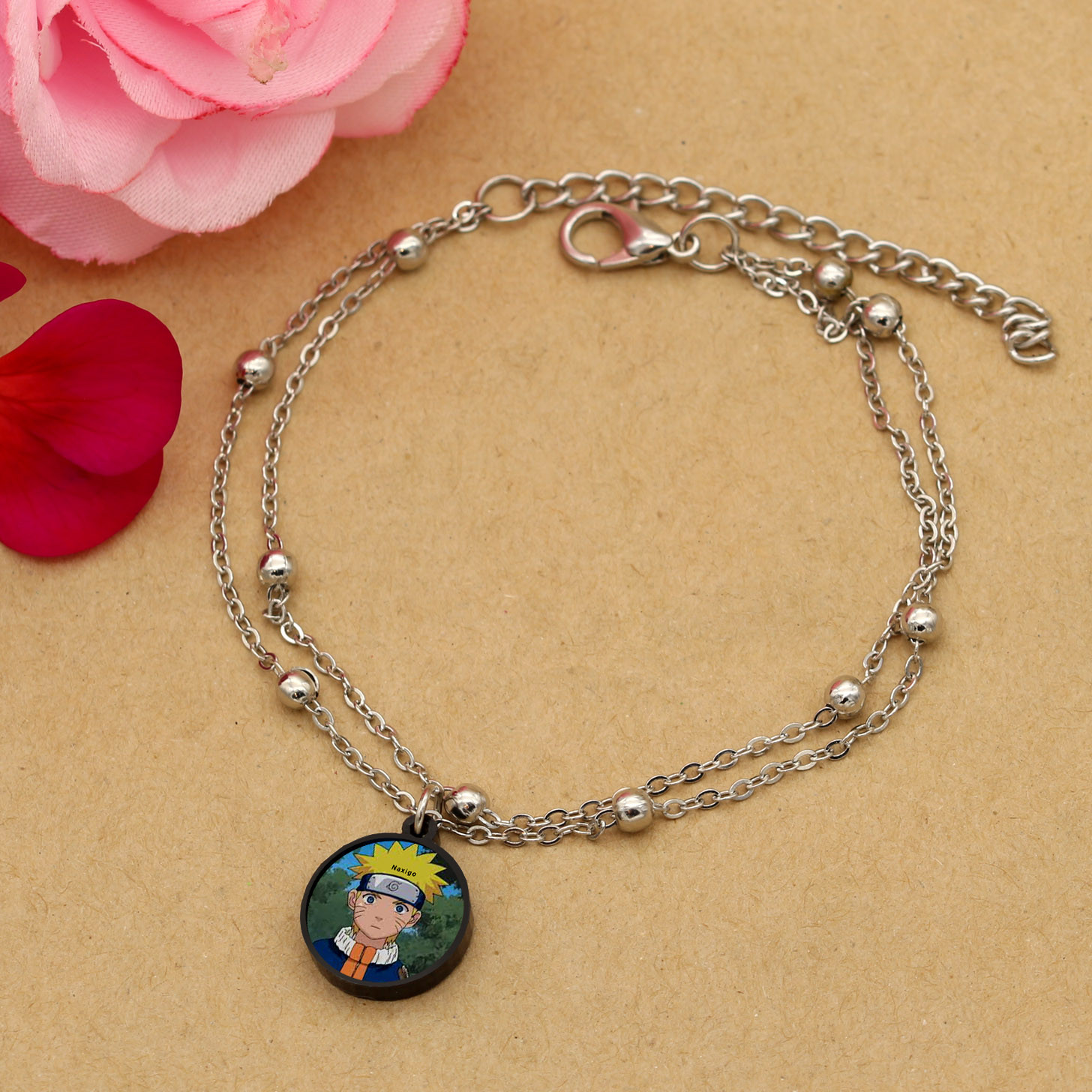 پابند زنانه ناکسیگو مدل شب تاب طرح ناروتو کد LB7392 پابند زنانه ناکسیگو مدل شب تاب طرح ناروتو کد LB7392