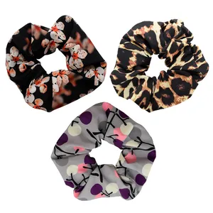 کش مو زنانه دلنار گالری مدل اسکرانچی شکوفه و پلنگی مجموعه 3 عددی