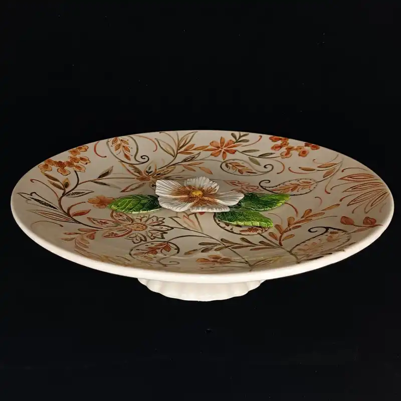 شیرینی خوری سرامیکی هیوا طرح خورشید بته جقه پایه دار گل برجسته کد 15173390