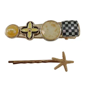 ست گیره و سنجاق مو زنانه مدل مجلسی نگین دار فلزی و ستاره دریایی