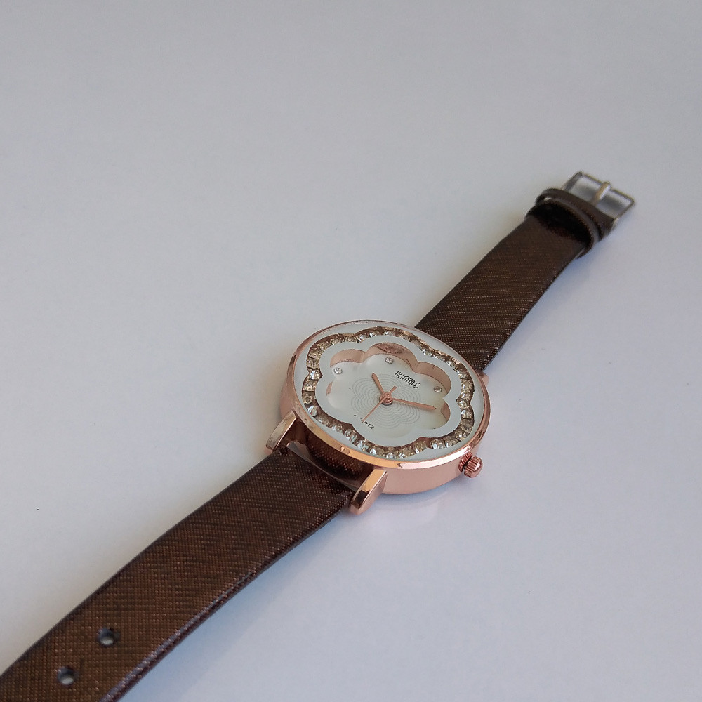 ساعت مچی عقربه ای دخترانه طرح گل کد 600