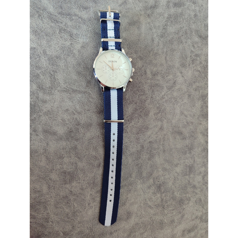 ساعت مچی عقربه‌ای مردانه مدل بند برزنتی کد 043