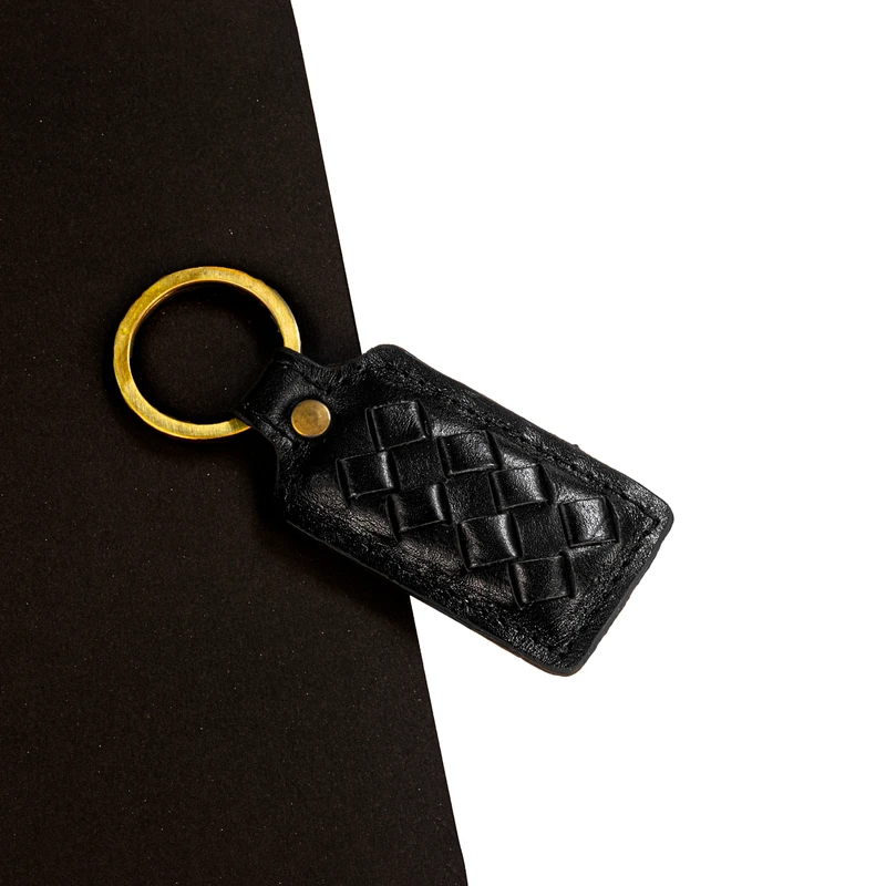 عکس شماره 6 : جاکلیدی چرمینه اسپرت مدل بافت