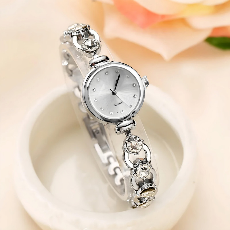 ساعت مچی عقربه ای زنانه مدل بند نگین دار دستبندی کد 2 ساعت مچی عقربه ای زنانه مدل بند نگین دار دستبندی کد 2