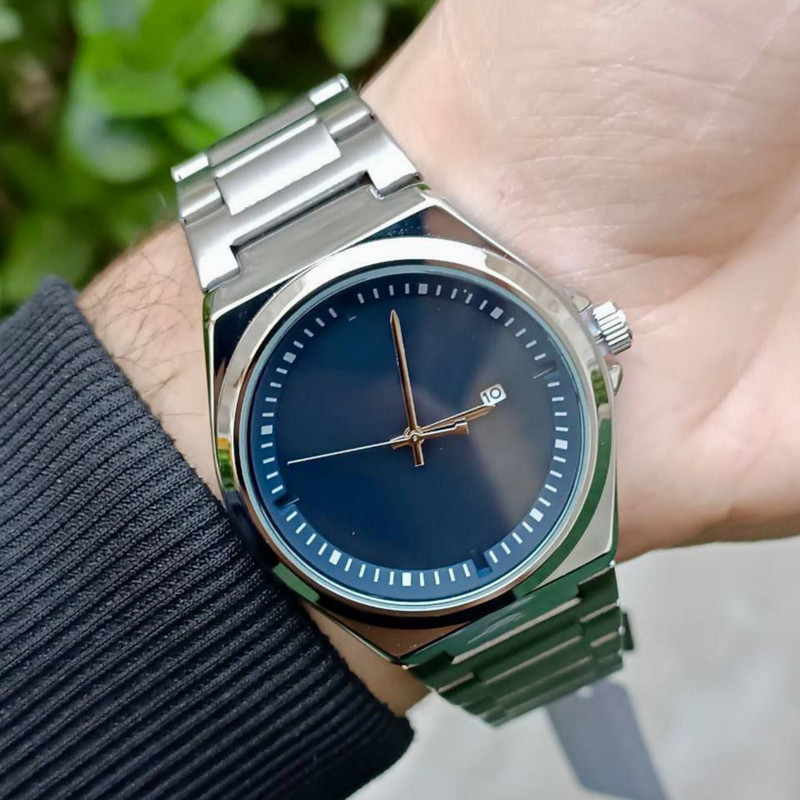 ساعت مچی عقربه‌ای مردانه کوارتز مدل کلاسیک بند استیل کد 04